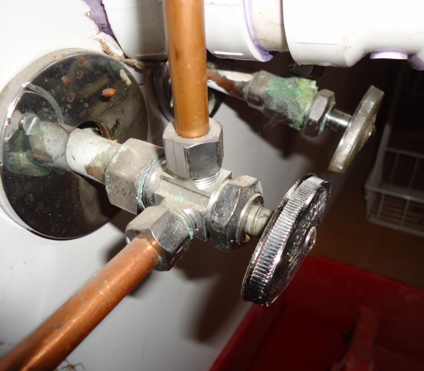 Corroded shutoff valves on a supply line