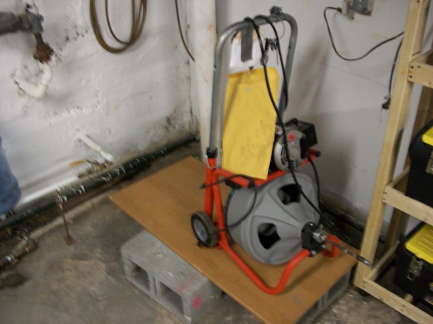A drain-cleaning machine
